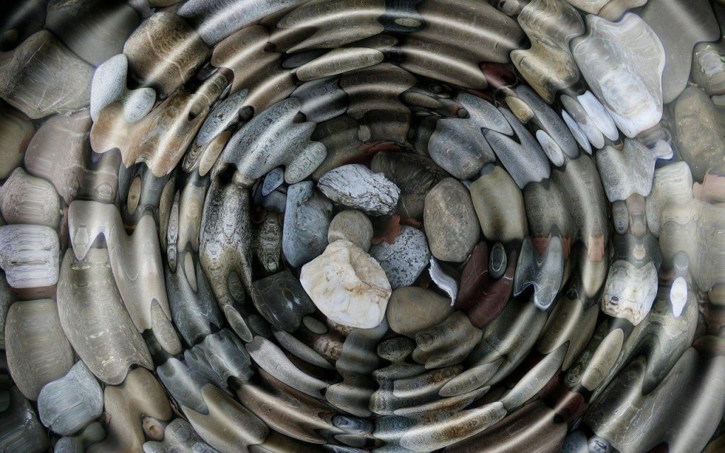 Rocks under rippling water.